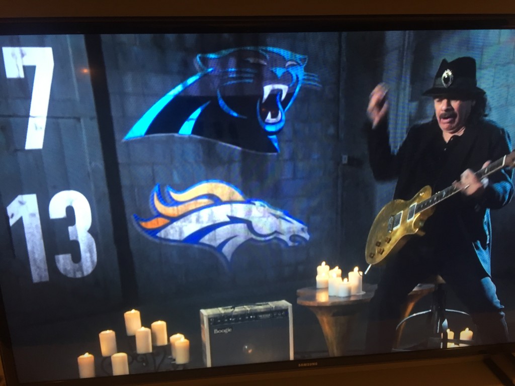 Screen cap of Carlos Santana during CBS' broadcast of Super Bowl 50