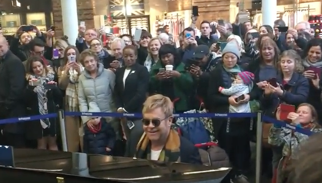 Elton John performing at London's St Pancras International station on February 4, 2016 (screen grab)