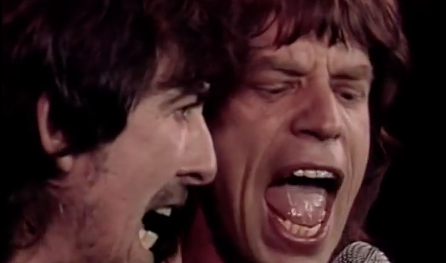 George Harrison and Mick Jagger duet on "I Saw Her Standing There" (screen cap from YouTube clip)