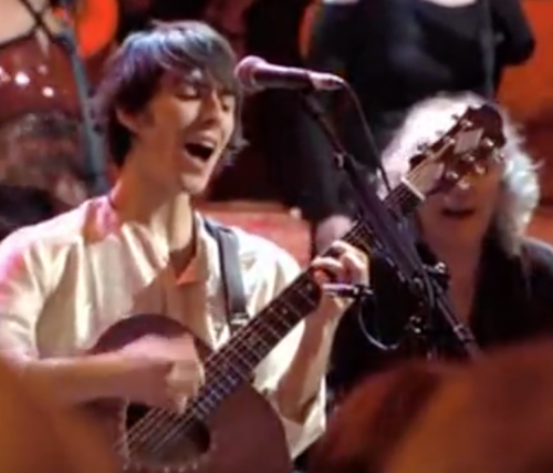 Dhani Harrison performing at 2002's Concert for George in London