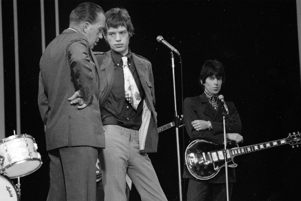 Ed Sullivan conferring with Mick Jagger