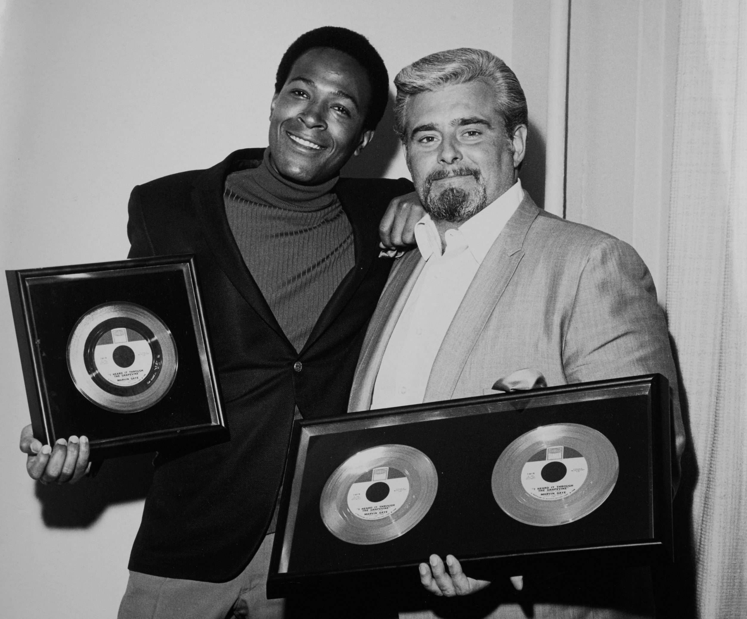 Barney Ales presents Gold Record awards to Marvin Gaye (Photo courtesy of Barney Ales. Used with permission)